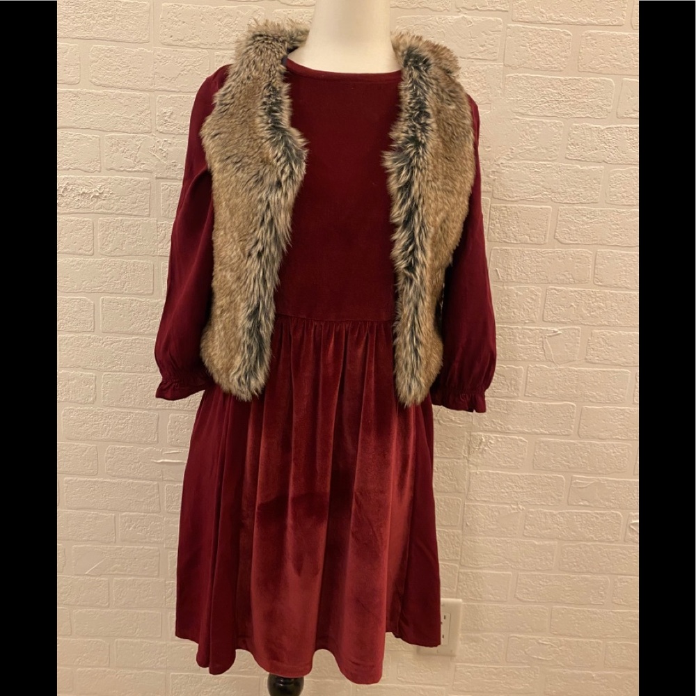 Girls Gap dress colour is rich burgundy